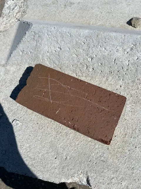 Found art on an ordinary brick.